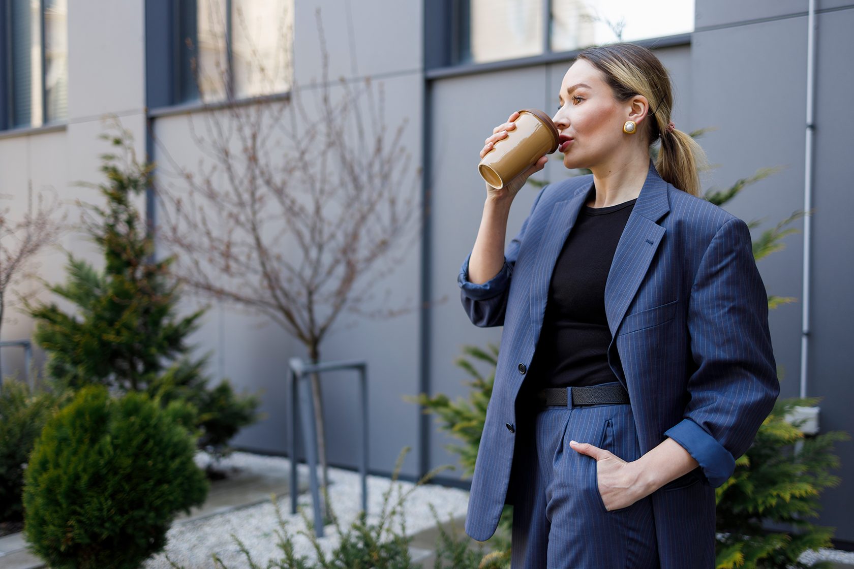 1business-woman-drinking-coffee-during-a-work-break-2022-06-06-23-12-53-utc